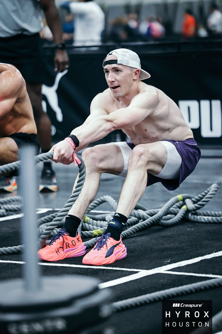 Adam on the sled pull at HYROX Houston