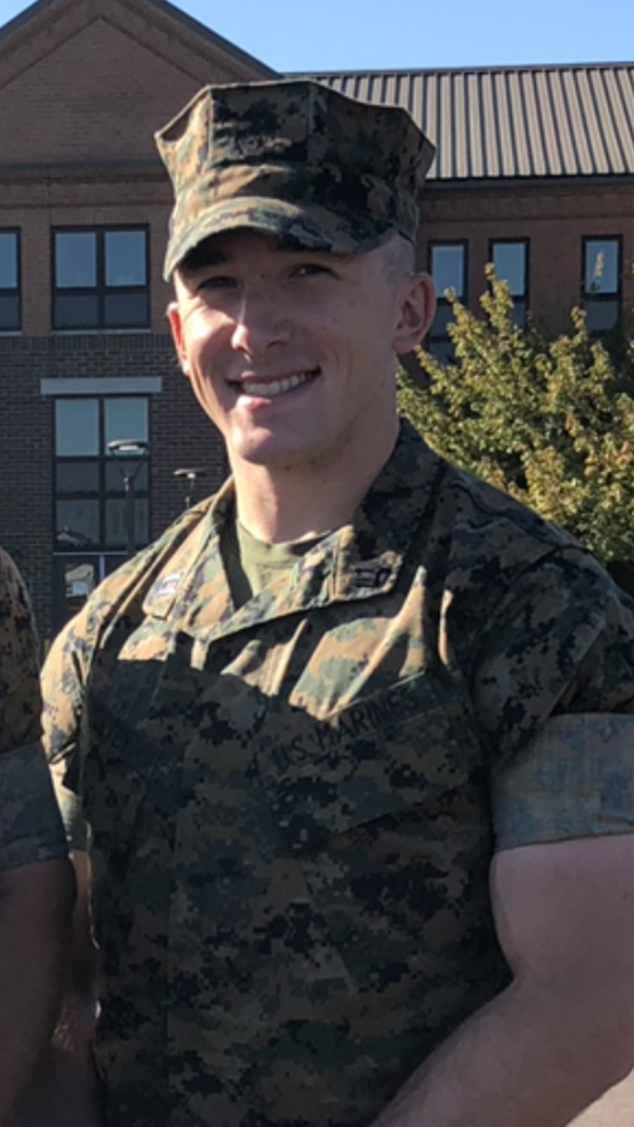 Adam smiling in Marine Corps utilities